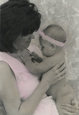 Handcolored photograph of Mother and baby